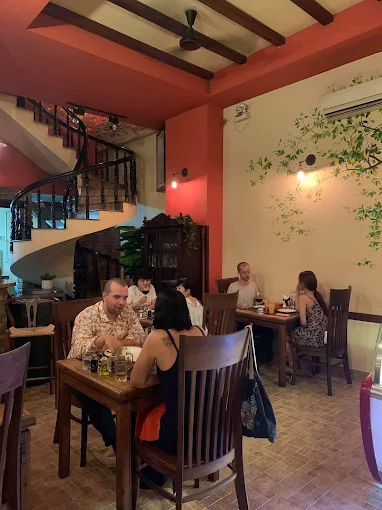Cozy interior with brick walls and spiral staircase