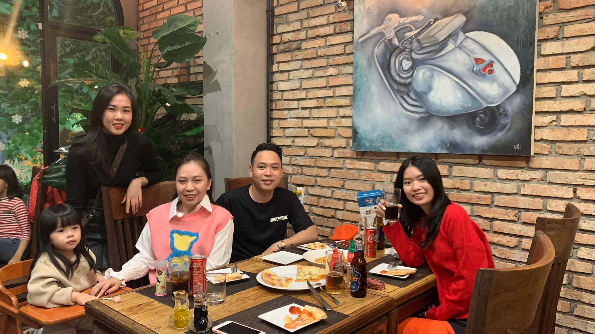 Happy guests enjoying dinner